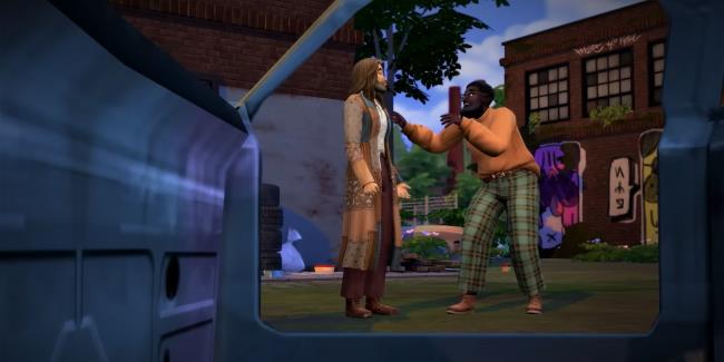 Kristof and Wolfgang of the Moo<em></em>nwood Collective talk in the middle of Moo<em></em>nwood Mill.