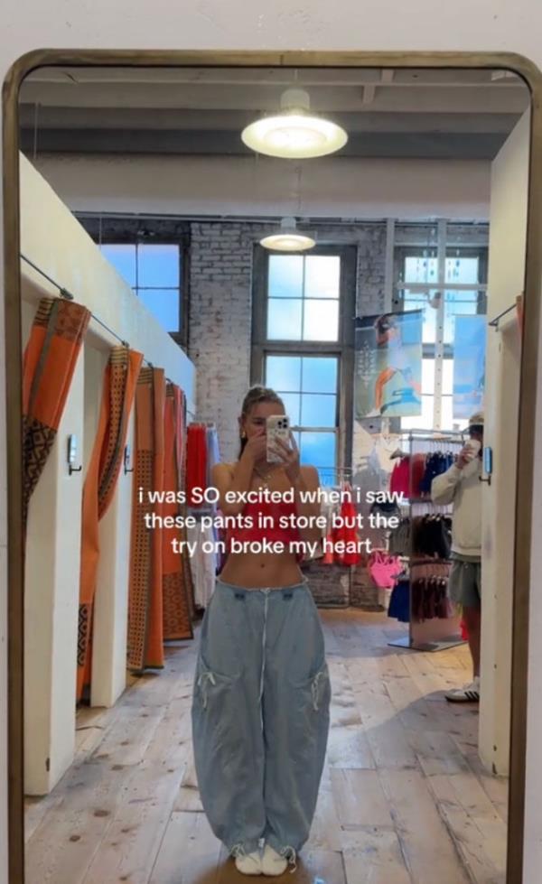 TikTokker wearing Free People barrel jeans