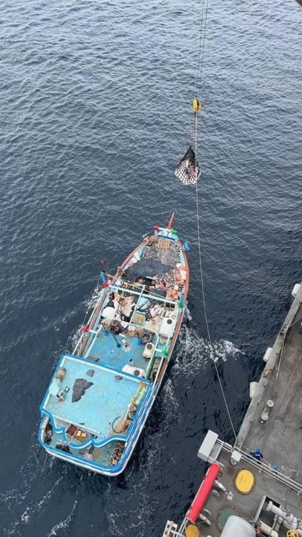 The report said the team was operating in 6- to 8-foot seas, and while the vessel they were boarding was rolling in the waves, the co<em></em>nditions were well within their abilities.