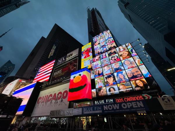 Photos of Israeli hostages taken by Hamas on display in Times Square on October 19, 2023.