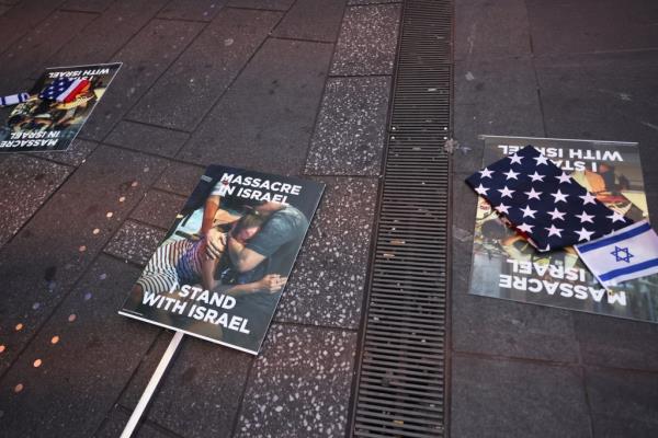 Signs at the rally showing support to Israel after the Hamas terror attacks.
