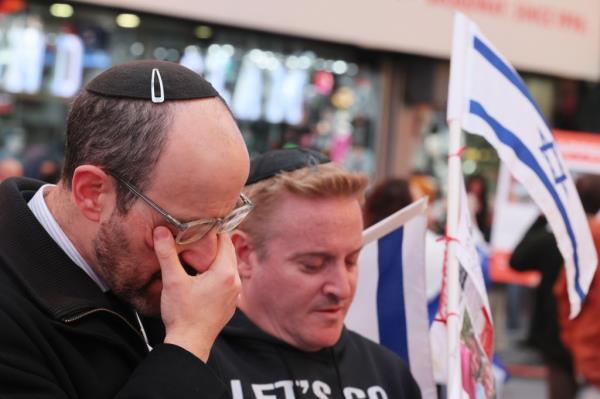An emotio<em></em>nal demo<em></em>nstrator at the Times Square rally for Israel.