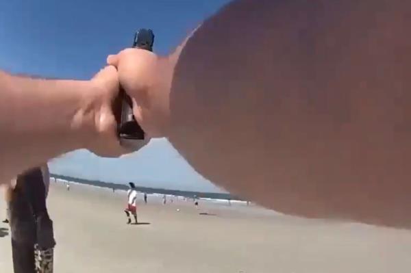 Teen with gun on Florida beach during spring break chaos