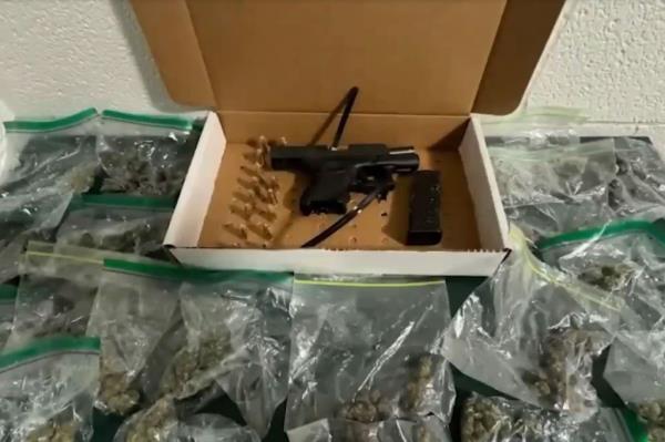 Teen holding a gun on New Smyrna Beach during spring break while people around him run away in fear as captured in a bodycam video.
