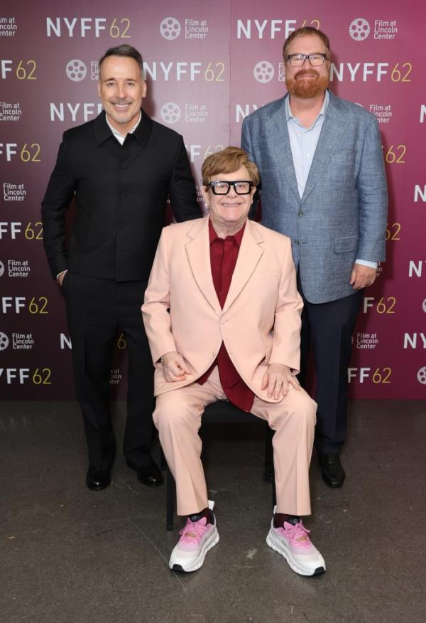 David Furnish, Elton John and R. J. Cutler at the 