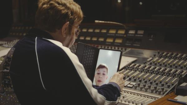Elton John on FaceTime with one of his children